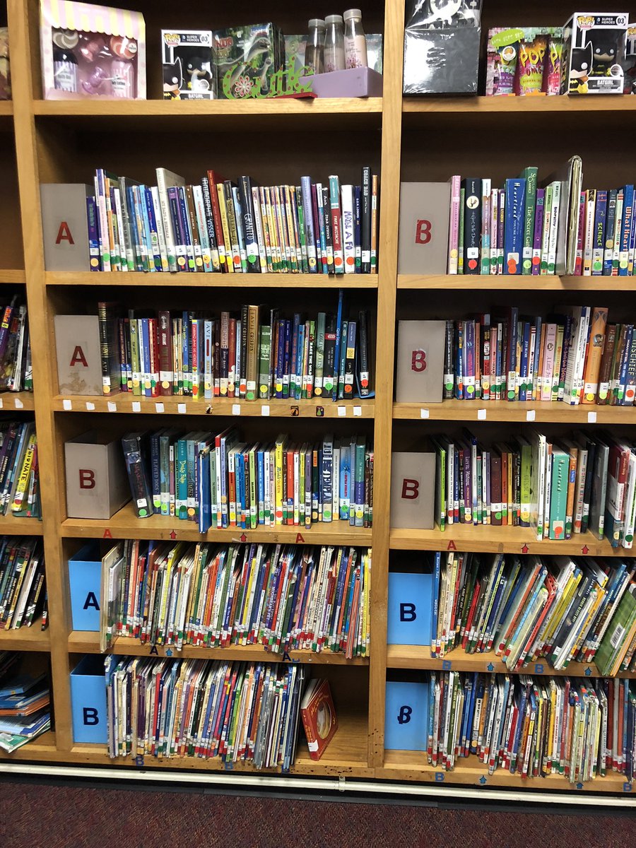 LibraryMacon's tweet image. I just finished marking the Nonfiction, Easy, and Fiction shelves in the library.  I took on this project to make it easier for my students to locate the shelves.  What do you think?  #librarymacon