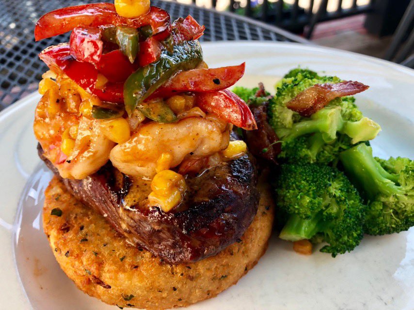 Start of the week with today’s lunch feature: Grilled Sirloin topped with 2 Jumbo Shrimp and a Rustic Chipotle Corn Salsa served over a Potato Cake with a sauté of Broccoli and Bacon