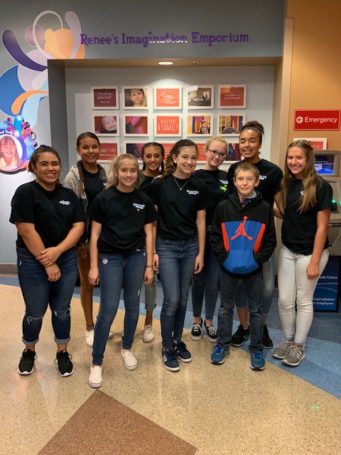 MMS_TeamThunder's tweet photo. Congratulations to our MMS WEB Leaders!  On Saturday, a group of WEB Leaders (including several Thunder alumni!) volunteered at the Diamond Children's Medical Center.  They created Halloween-themed arts and crafts (and countless smiles!) with children and their families. 🎃 https://t.co/lTPIFzUQ3X
