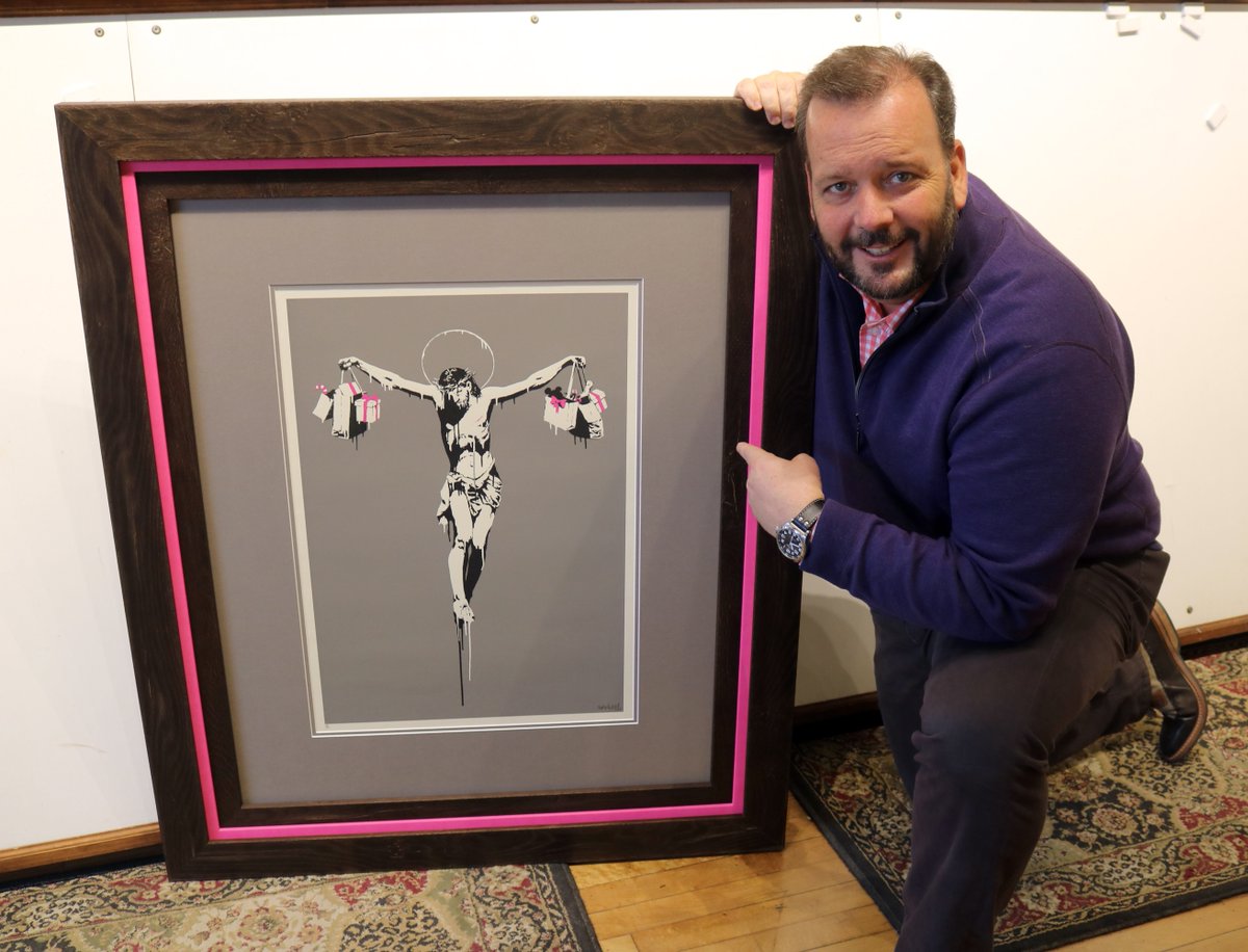 TGFUWFB's tweet photo. This Banksy framing turned out fantastic! Love the pop of pink against the dark, weathered stacked frames. #banksy #banksyart #pictureframing #customframing #mke #milwaukee #tgfuwfb https://t.co/gYx3mVI7LG