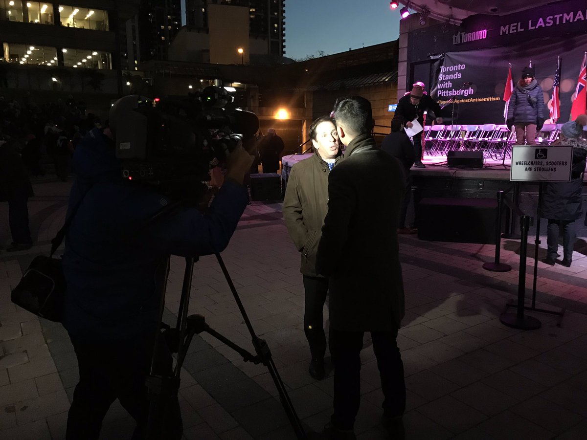 bnaibrithcanada's tweet image. Our CEO @MichaelMostyn speaks to the CBC’s @AdrianCheungCBC at the community-wide vigil in support of the #Pittsburgh victims at Mel Lastman Square in Toronto.