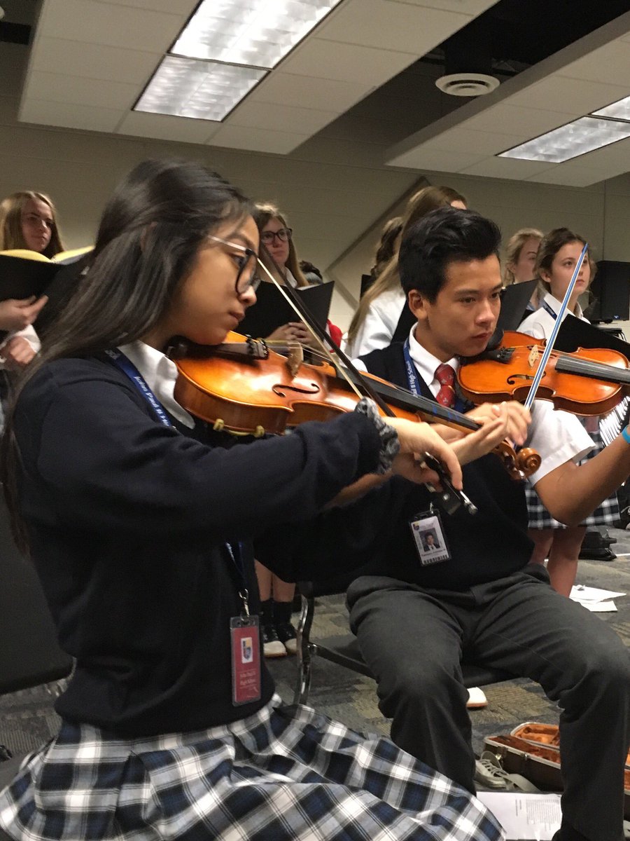 Rehearsing for All School Mass on Thursday....Freshman violinists Maddie and Theo!!!