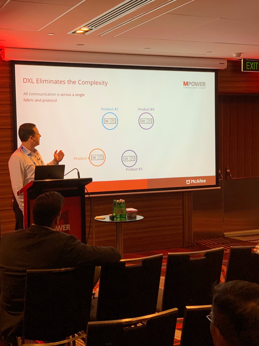 McAfee's tweet photo. Andrew Longhorn discussing the importance of simplifying open and integrated security. #MPOWER18 https://t.co/Z9YUb87Cry