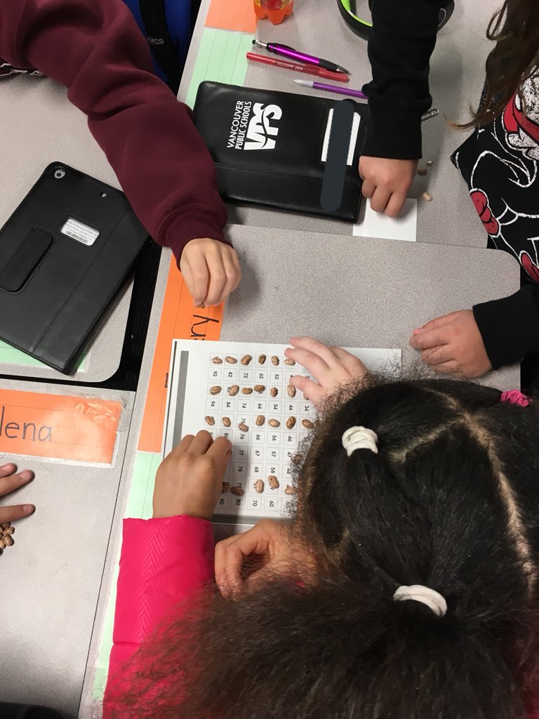 DLECoach's tweet photo. Had a blast working with @VancouverSD teacher @Mr_Massinger 5th grade Ss at Chinook ES on teamwork with group problem solving involving 100 charts, beans, and number clues. Lots of critical thinking, communication, productive struggle, and FUN! #VPSHiCap https://t.co/hZYCWkFcMS