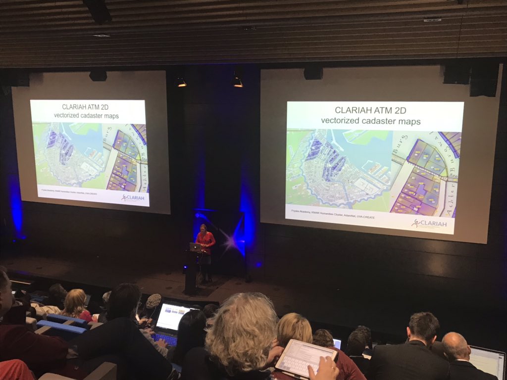 TimeMachineEU's tweet photo. First up in the Local Time Machines session, @jjnoordegraaf with the #AmsterdamTimeMachine! She asks: how do we connect all this data and make it accessible? Currently they are building geo-based grayscale city models with @CREATE_UvA which will have details added over time 🌃 https://t.co/RNvKaKwORA