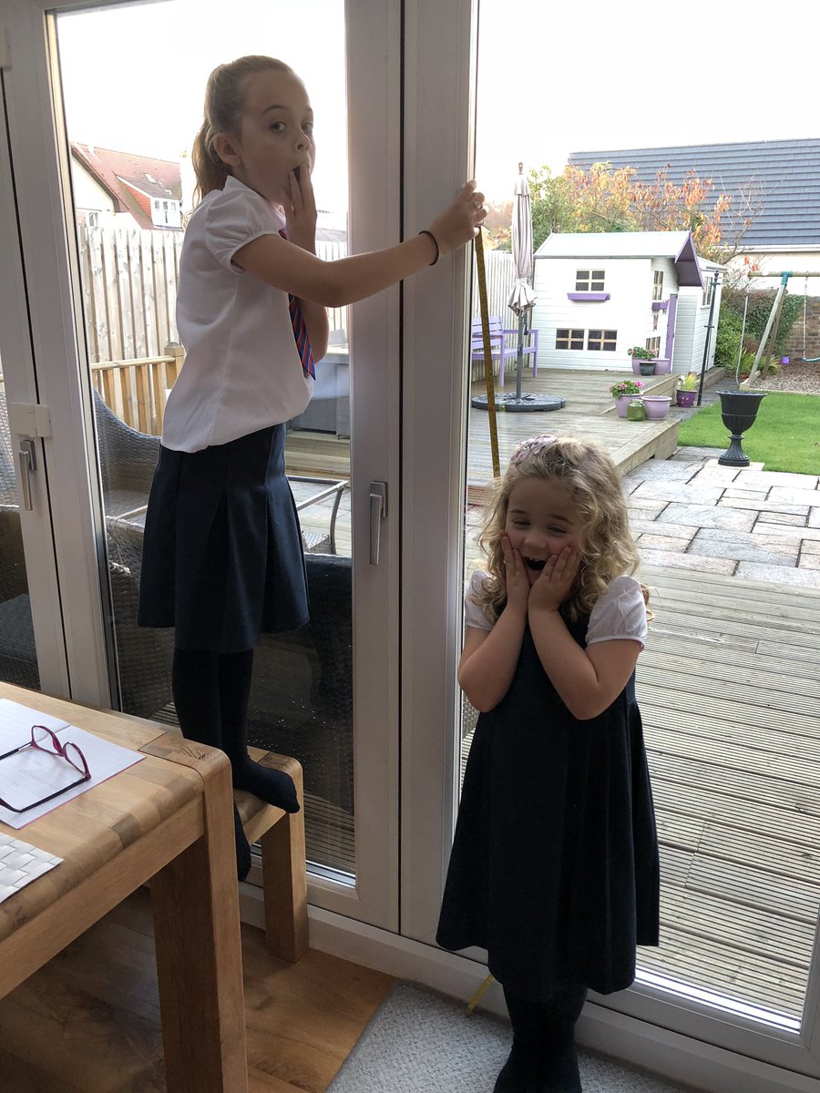 MelanieForsyth's tweet photo. @morayPS Ruby and Martha measuring the height of each other #mathsweek2018 @jas_forsyth https://t.co/PpBvmbyEaW