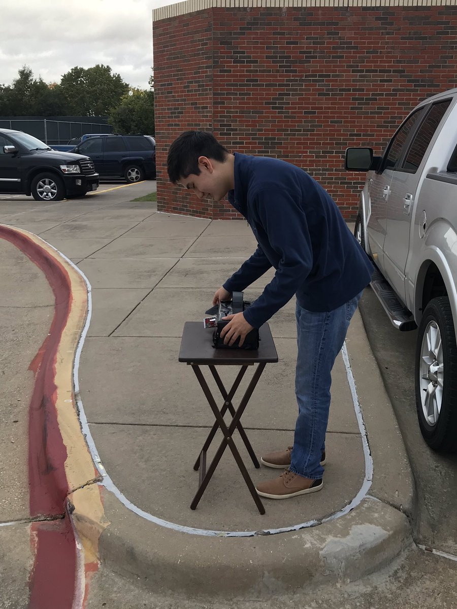Student taking a photo with his pinhole camera.  #EmpoweringTrojans #cfbisd #cte