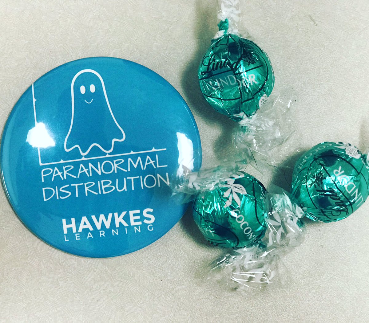 ProfTasaka's tweet image. Cutest button ever! Thanks @Hawkes_Learning for my #paranormaldistribution button &amp;amp; thanks to my kind student for the #Halloween #candy 🍬🎃