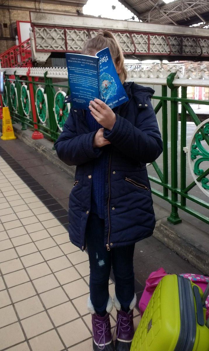 Katharine59's tweet photo. 1. A young girl engrossed in her just-purchased 'Stegalegs at Spinning River' @PrestonStation platform (photo by permission from her mum). 2. Kay (cupcakes) and me love our #PopUp stalls and our #customers. https://t.co/K1EraaQNmX