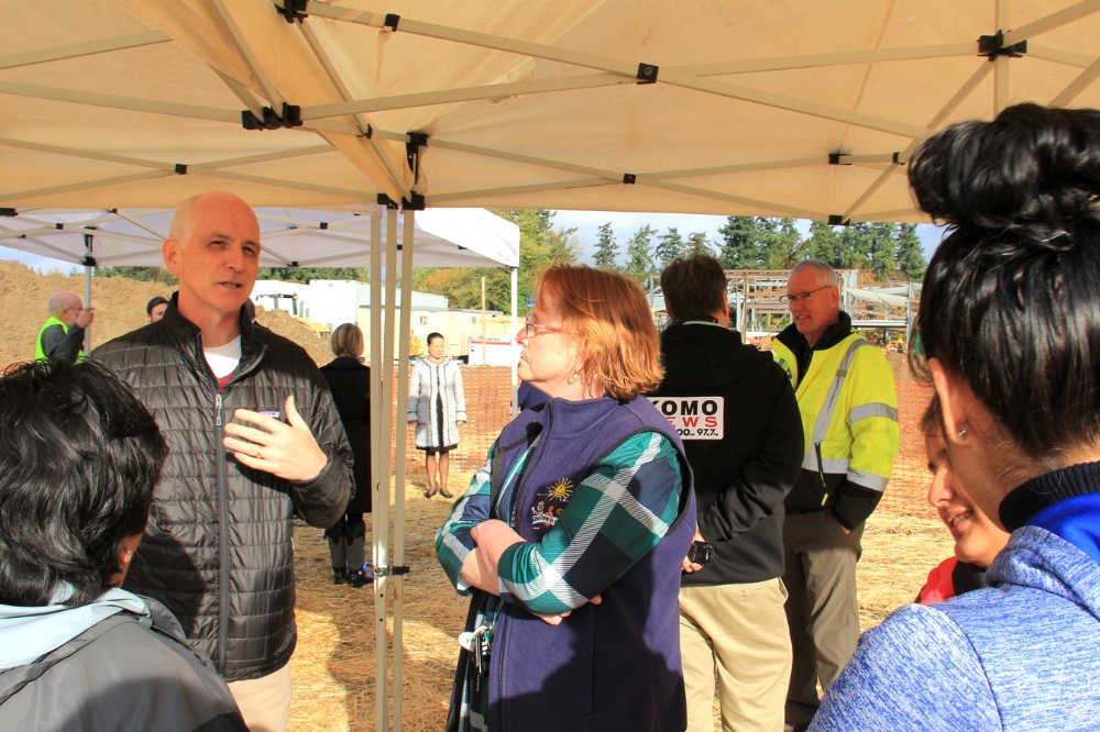 Rep. Adam Smith talking with CFAC members.
