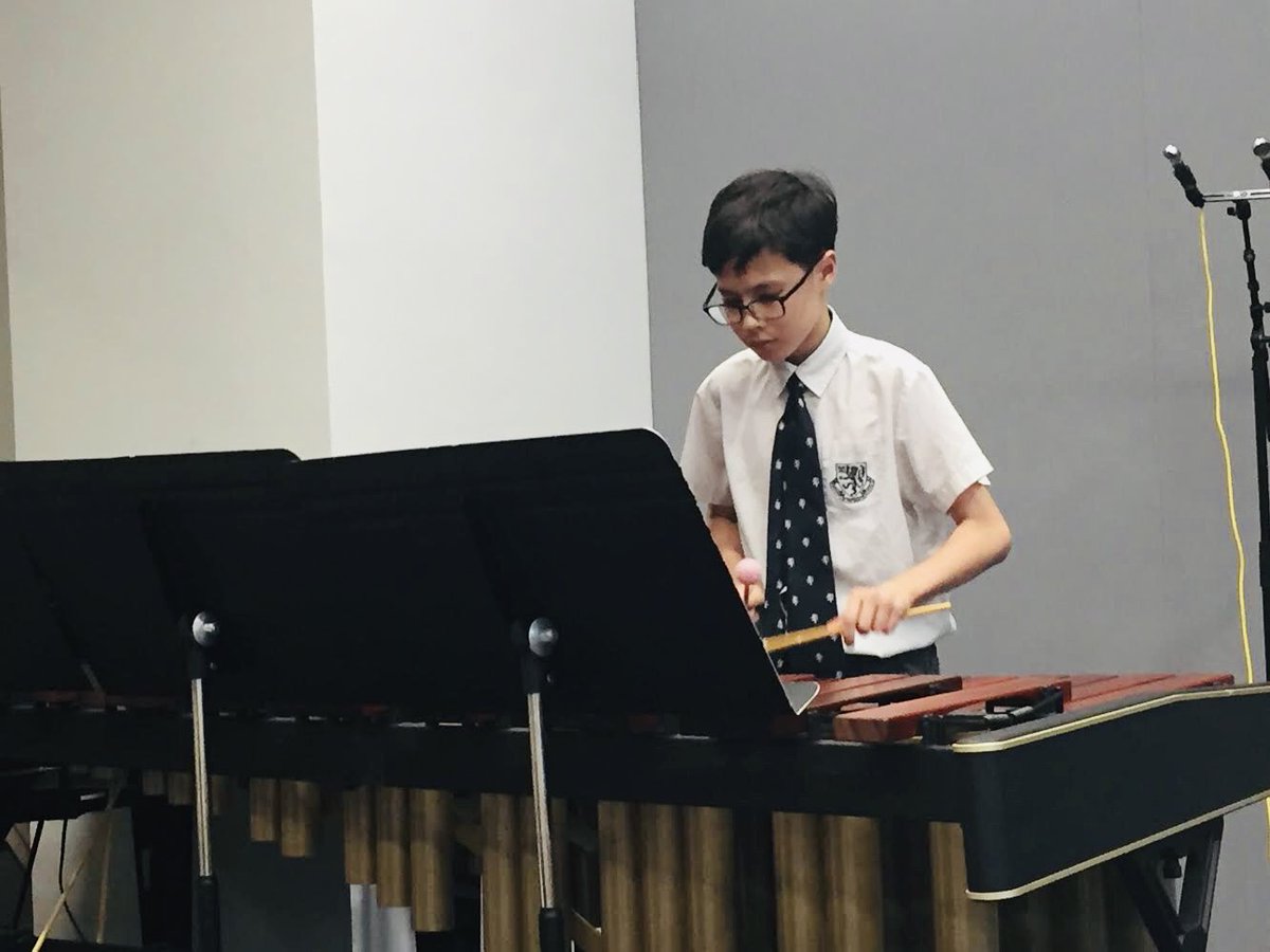 HHKSShackleton's tweet photo. From ice hockey aficionado, to rocking out in his percussion recital, Callum is setting a great example to the #boysofshackleton, broadening his opportunities with an enriching number of after school activities @Harrow_HK @HeadHarrowHK #boysofcourage #shackletonfamily https://t.co/kyRT91VjsS