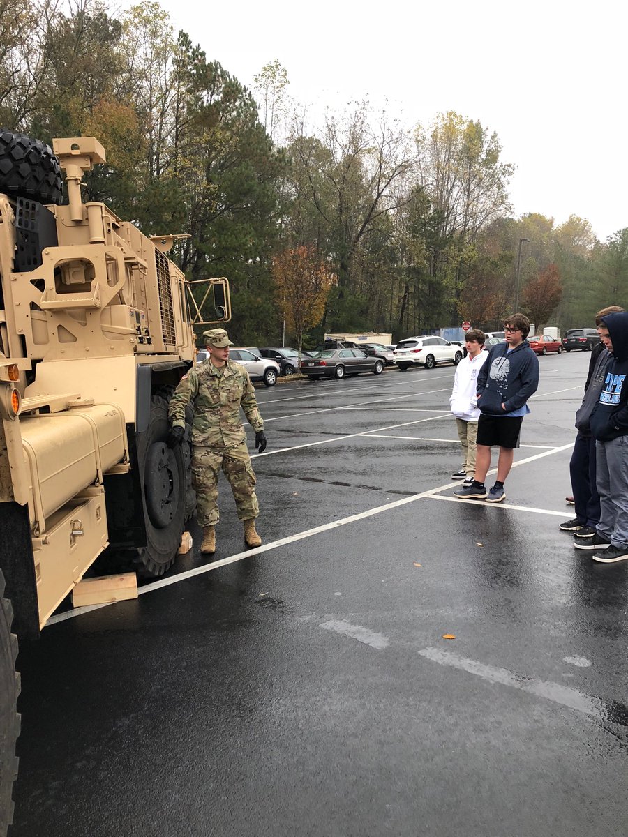 JeffreyPaulMill's tweet photo. No better way to study hydraulics and pneumatics than climbing around on a big military vehicle. #popehighschool #popestemacademy https://t.co/cw5KrgYXdR