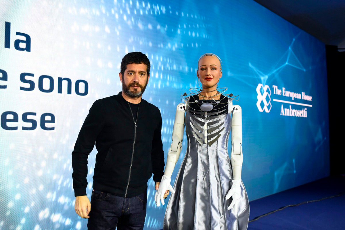 negrifirmanpr's tweet photo. Worldwide renowned @RealSophiaRobot wears a piece designed by @futuro_remoto at the GEOPOLITICA DIGITALE Symposium. Sophia the Android robot was created in 2015 by @hansonrobotics . #NFpeople #NFloves #Technologynews https://t.co/vvkHOyquOY