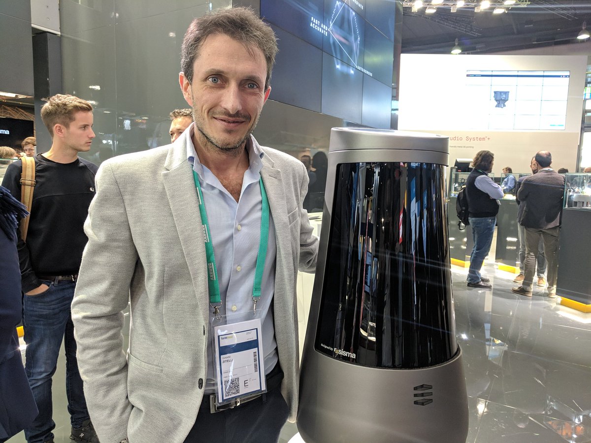 3dprintindustry's tweet image. Gianni Zitteli and his latest invention. The new Sisma EVERES DLP resin #3Dprinting system. #FormNext2018 #formnext