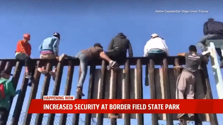 Caravan invaders jump border near San Diego - military no where to be found