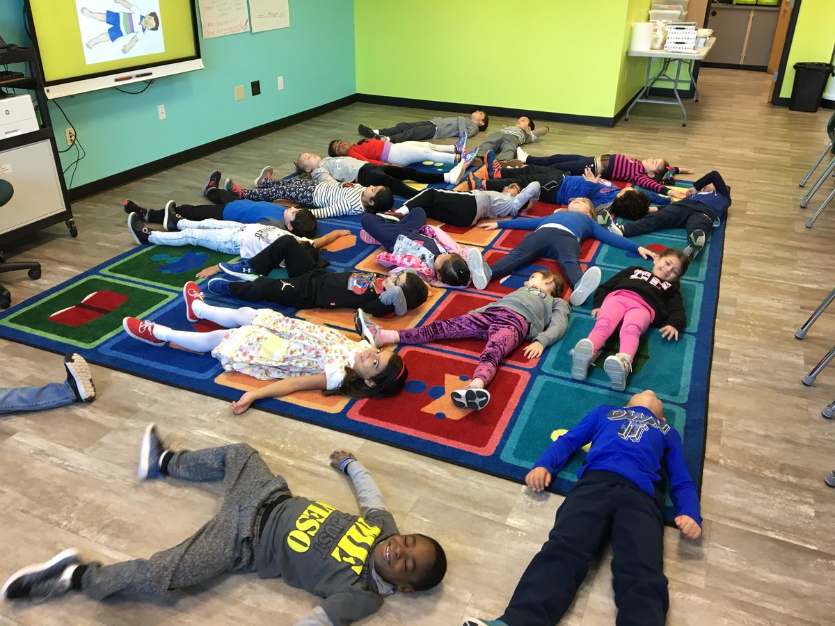 Who said you have to sit still during storytime? HES 2nd graders are loving storybook yoga!