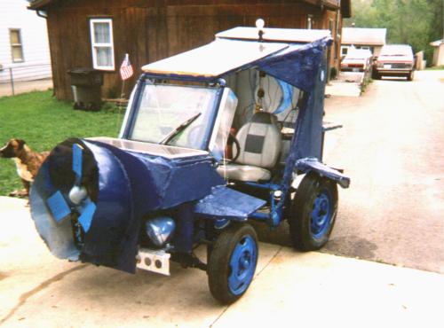 35. This home build doesn't have a name; Iowan Joseph Rush made it himself and it has solar panels that give up to 75 watts total in sunlight and a wind turbine on the front that generates up to 400w on a 28mph wind. I love it, what an awesome shed creation: