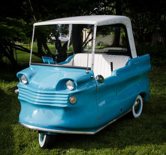 74. Before silicone valley, the Electric Car Company of California made these, the Shopper. This one is from 1960 and was sold with the, uh, ambitious idea it would be reliable for 25 years. Its top speed was 18mph and it had a range of about 35 miles.