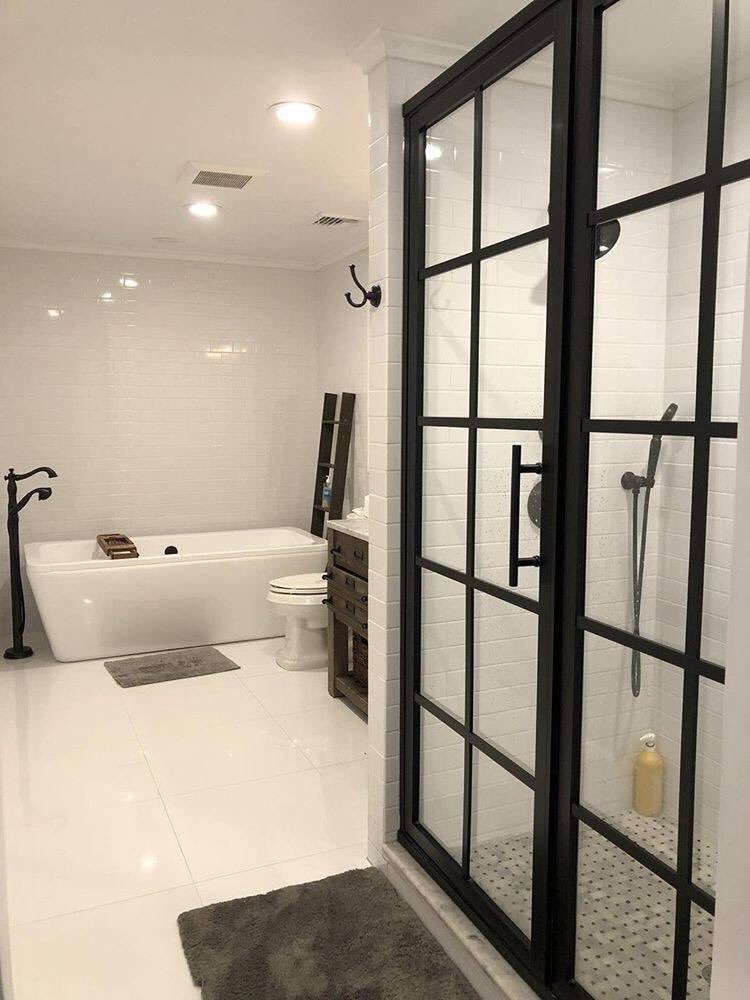 Thanks to Coastal ICON Jenifer for sharing her bath with us. We love the way she paired the Gridscape door with floor to ceiling subway tiles to create a beautiful design. Read more about the design and see more images at coastalshowerdoors.com/iconsblog