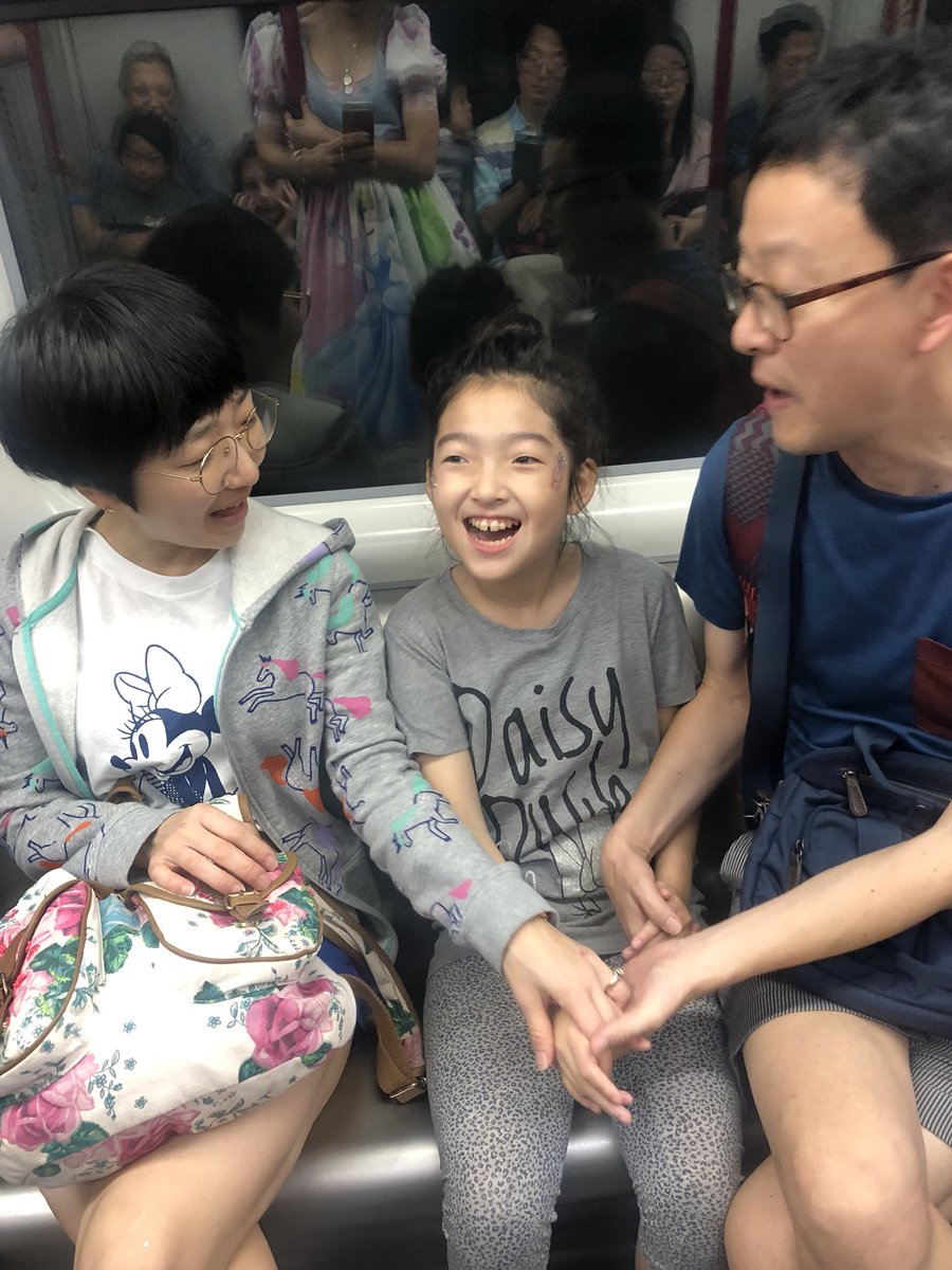 chloeshayden's tweet photo. On a train in China I saw a little girl watching me.
I had glitter on my cheek and asked her parents if I could put some on her too
After 20 mins of playing her parents told me she was mute severely disabled and that this was the first time she’d ever smiled.
My heart is so full. https://t.co/opPBHnfKCq