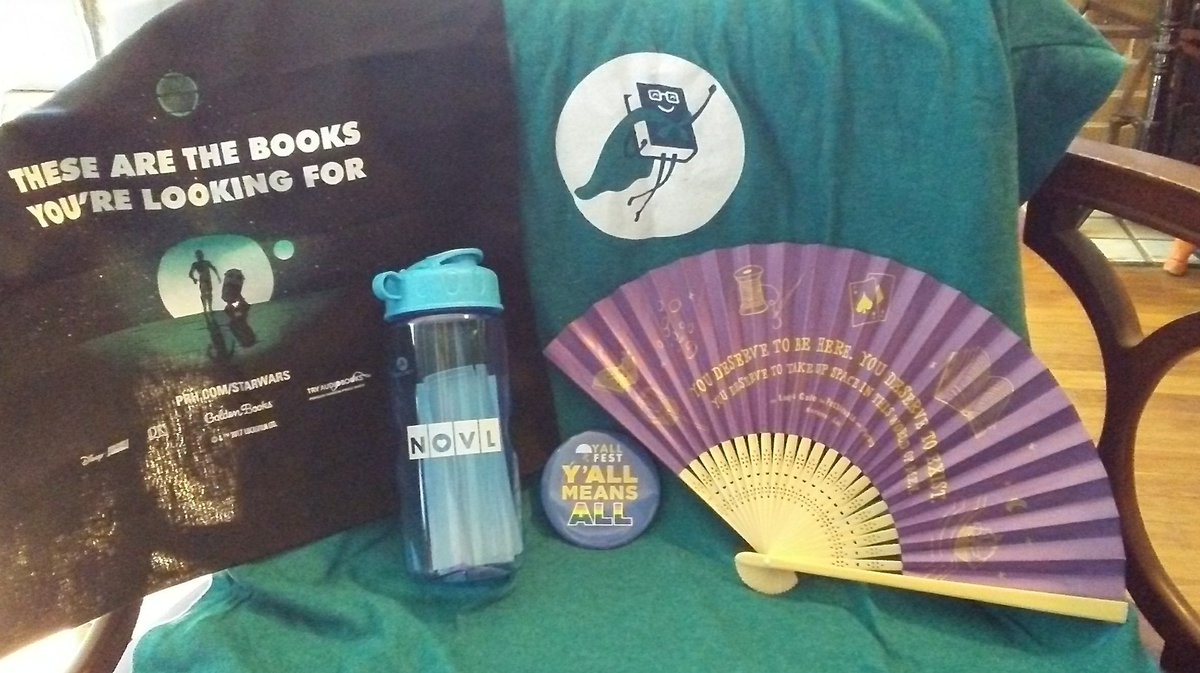 X_Sanguine's tweet image. A couple days late, but here&apos;s some pics of all the books and swag I picked up at #YALLFEST Loving the beautiful #ladysguide fan and the #stepsister glass slipper &amp;amp; super excited for #deathprefersblondes and #waitingforfitz!