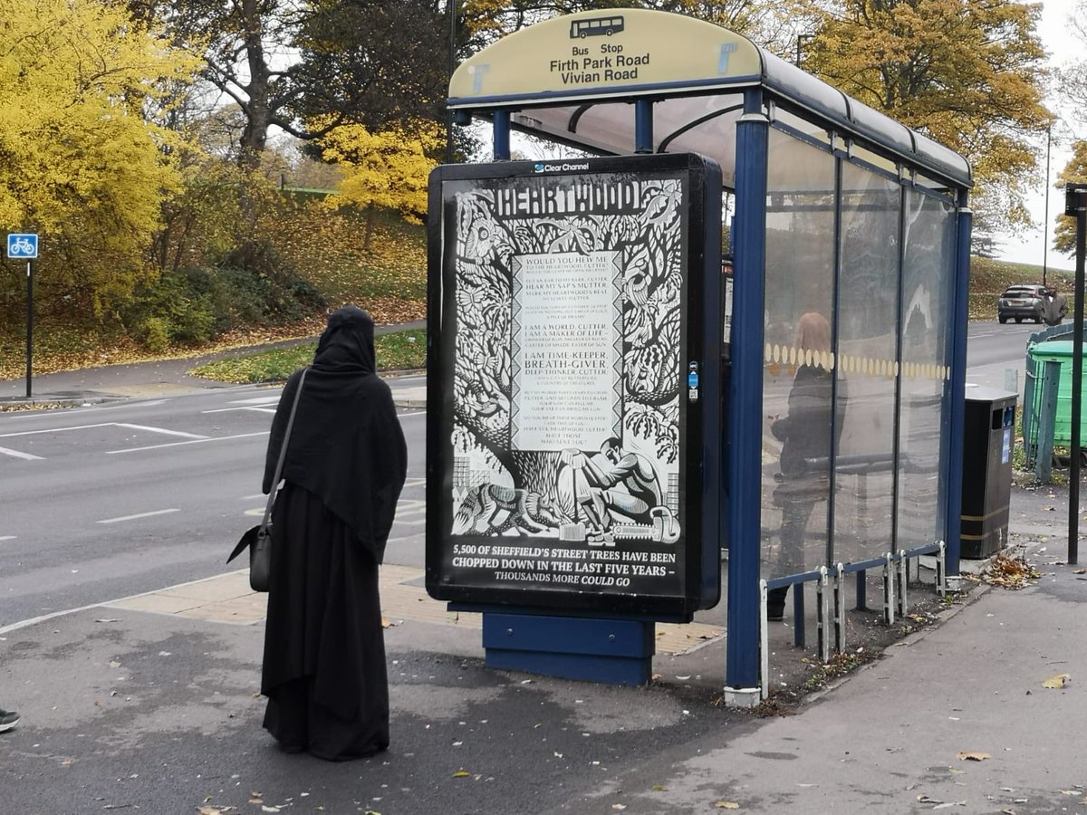 RobGMacfarlane's tweet image. I wrote a poem for the Sheffield Tree Protestors called “Heartwood”,
in defence of trees facing unjust felling anywhere in the world. The artist Nick Hayes made a broadsheet poster of it. Inexplicably, two nights ago huge versions of Heartwood began to appear around Sheffield...