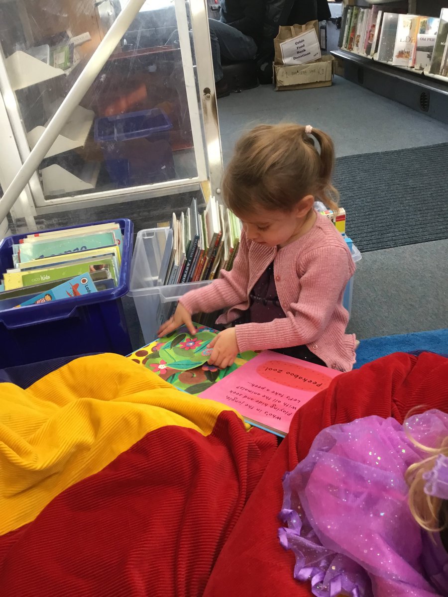 We spent some quiet time in the library bus today! We each chose a story to look at and enjoyed the time to relax. #earlyliteracy #quiettime #communityengagement