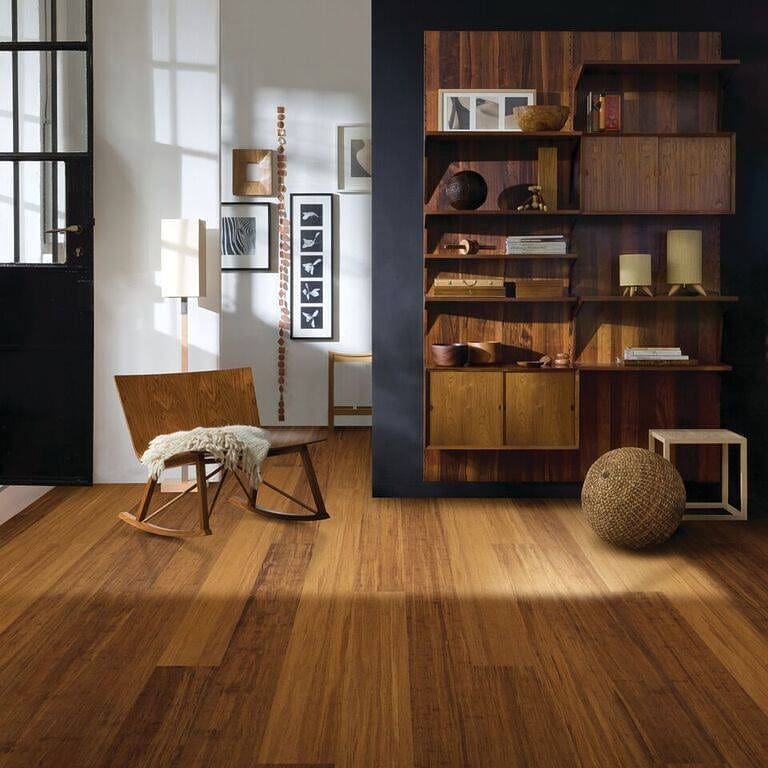 This living area defines its functions with distinct furnishings. The Xcora Chestnut Engineered Strand Bamboo floors tie the modern design together and bring cohesion to the space.