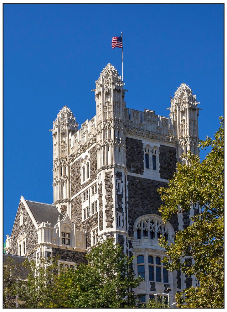 CCNY Shepard Hall tower with flag flying. Photo: Carlos Parker