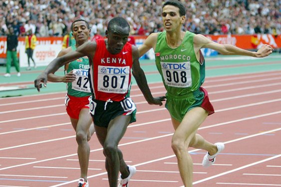 TStellingwerff's tweet photo. Rumours today are that @kip @EliudKipchoge is over 40yrs old. Does it actually matter? Either he truly was 18 yrs old when he won worlds in 2003, or he is actually over 40 yrs when he just ran the marathon WR (see photos) - either are insane and shows age shouldn't be a barrier. https://t.co/iQ1Y4w9bKT