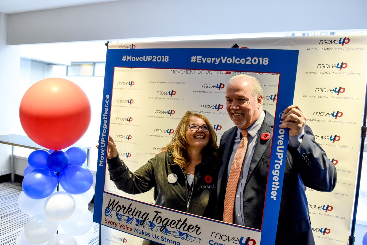 MoveUPTogether's tweet image. Photos with Premier @jjhorgan on our selfie wall at Convention? That’s pretty darn cool. Almost as cool as voting YES for #ProRep. 😎 #MoveUP2018 #EveryVoice2018