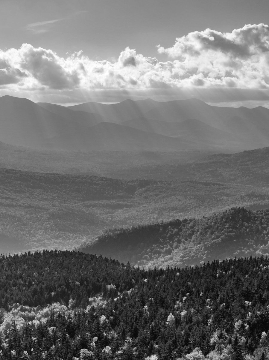 SeacoastAerial's tweet photo. One of my favorite parts about being on top of a mountain is seeing the layers upon layers of ridges and peaks. Here are some black and white shots from South Moat Mt to highlight that aspect. #whitemountains #dronephotography #visitnh #nh #blackandwhite https://t.co/4K5wlSOsg9