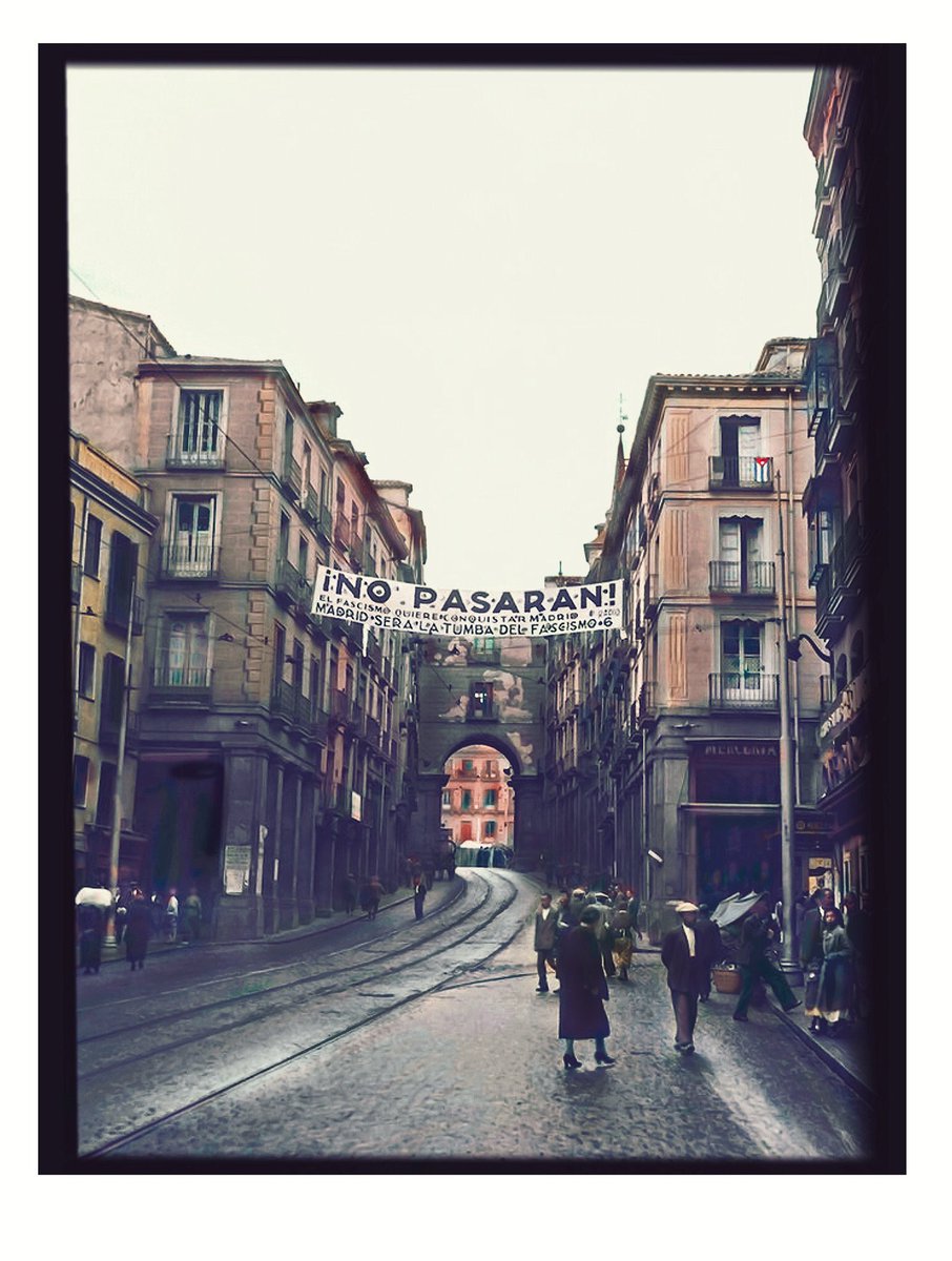 latinapaterson's tweet photo. “No pasarán”. Calle Toledo, Madrid. Fecha desconocida posiblemente octubre 1936. Foto Mijáil Koltsov. Archivo EFE. Coloreada. https://t.co/aPPeNs4Tnl