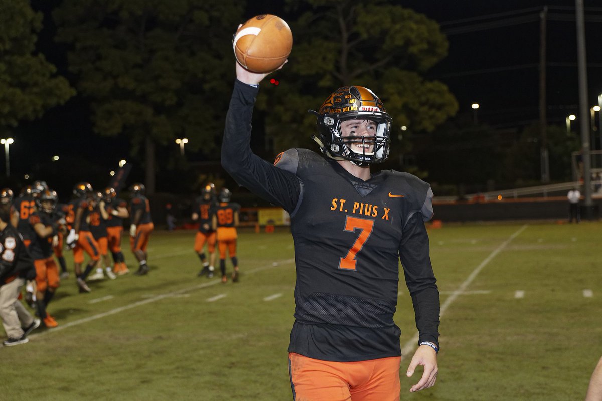 Congratulations to Grant Gunnell on becoming the Texas High School career passing touchdown leader. Here Grant displays the ball to an enthusiastic St Pius X crowd that Kaleb Ducros caught in the second quarter to set the record.
