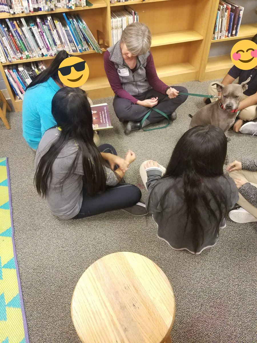 Another shot of our <a href="/ELAFAwildcats/">East Lake Academy of Fine Arts</a> ELL students reading to a sweet puppy friend and volunteer from <a href="/McKameyCenter/">McKamey Animal Center 🐾</a>! 🐕😍📖