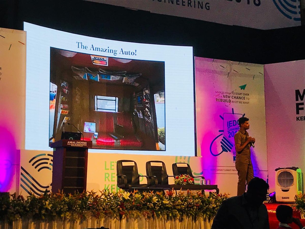 startup_mission's tweet photo. Annadurai @AutoAnna avows students as he shares how he provided a range of customer-friendly measures from #Wifi, fridge, #Alexa, Google Home, magazine stand and even a swiping machine for passengers in his auto. #IEDCSummit18 #IEDCSummit #IEDC #MakerFest #MakerFestKerala https://t.co/Uz3ibZiQPo