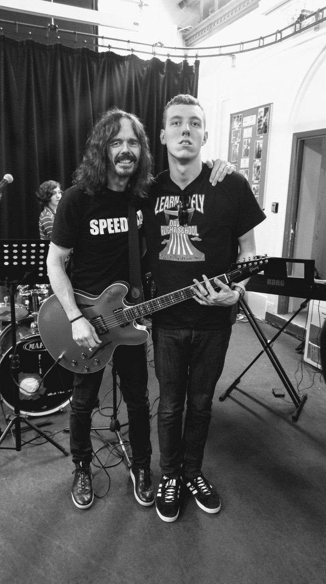 We went to my son's college today, in Brighton @stjohns_sussex to watch @JayApperley of the @ukfoofighters perform with the 5 lads in my previous tweet.  Jay posed for a picture with Sam after a chat. The nicest man in Rock! #Autism #autismawareness #davegrohl #foofighters