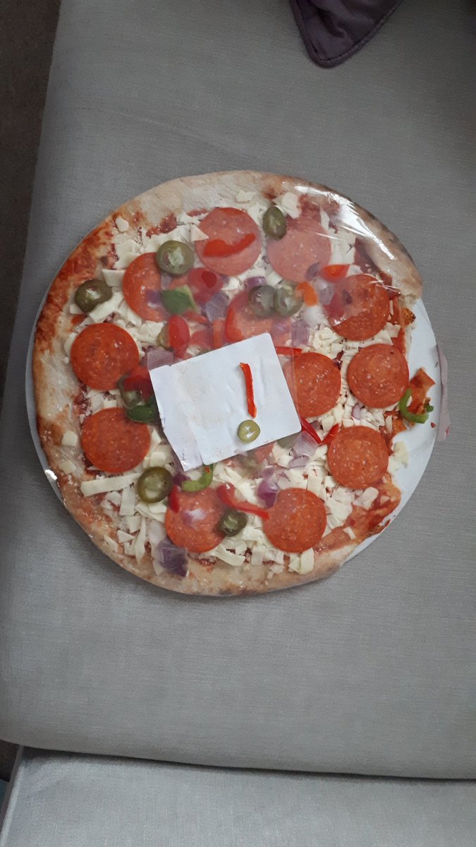kryhoward's tweet photo. @sainsburys got my pizza home only to unwrap it and realise there was a big chunk missing out of it! 🤔 https://t.co/Su4uharw8S