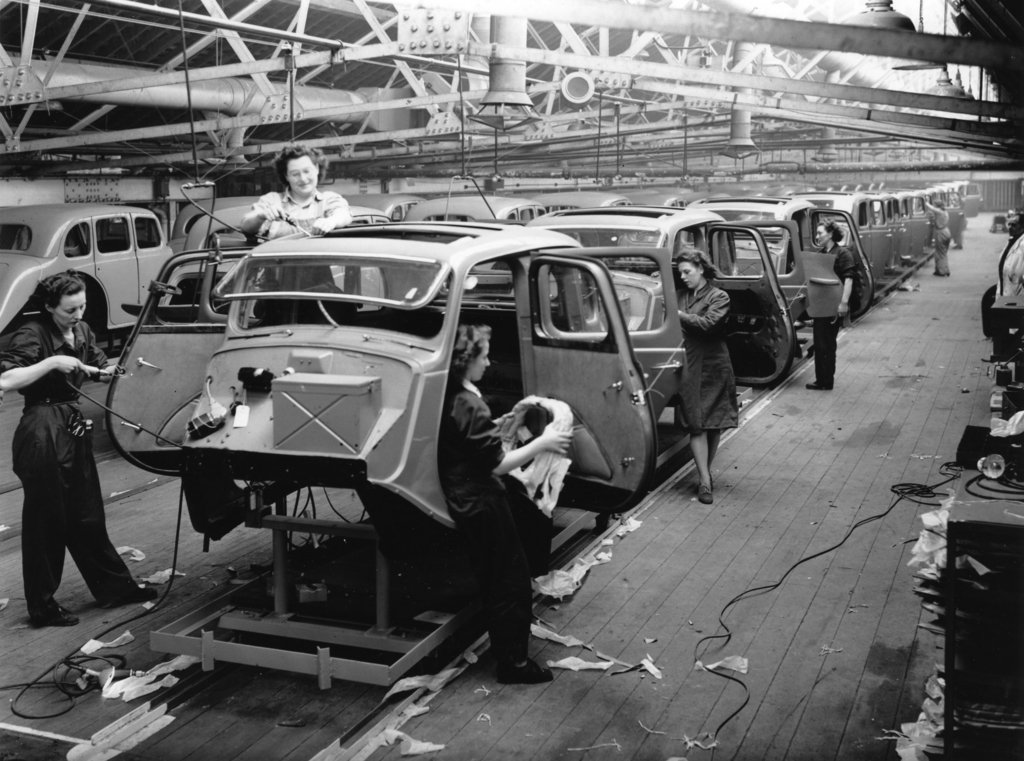MGCarClub's tweet photo. Interesting find in our archive - a group of women working on the interior trim assembly line in 1947 fitting interiors to Y-Types!
#MG #YType https://t.co/gl85eCDZie
