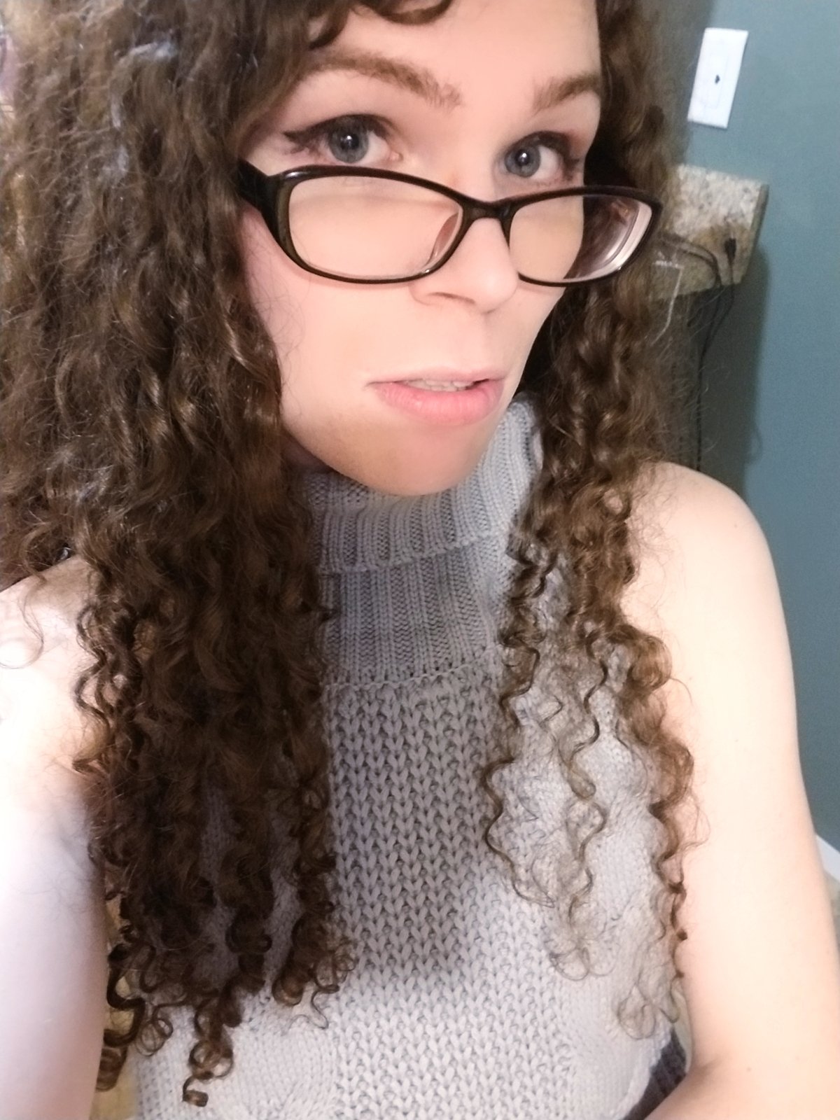 She showcases her latest dress with flair