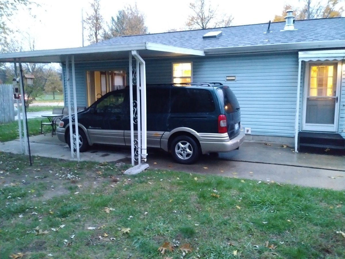 frankaw11's tweet photo. So I parked my $400 Montana under the patio cover in my backyard so I can wrench on it over the winter with some shelter. Got a bad belt tensioner, bad intake manifold gasket, no overdrive. Some may call that #redkneck I call it #puremichigan @Jalopnik @davidntracy https://t.co/4QcFAfbosa