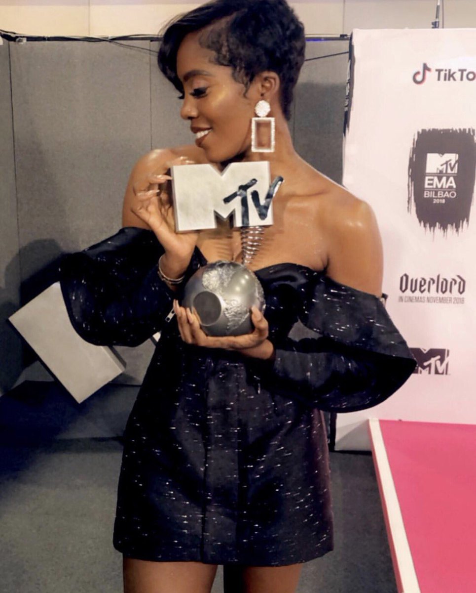 oziebent's tweet photo. African bad gyal @tiwasavage wins Best African Act at the 2018 #MTVEMAs. The award show was held earlier today in Barakaldo, Spain. #congratulations 🇳🇬
.
.
.
#tiwasavage #bestafricanact #savagesoldiers #mtvema #mtv #spain #afropop #afrobeats #nigeria #oziebentertainment https://t.co/r0OiibzkhF