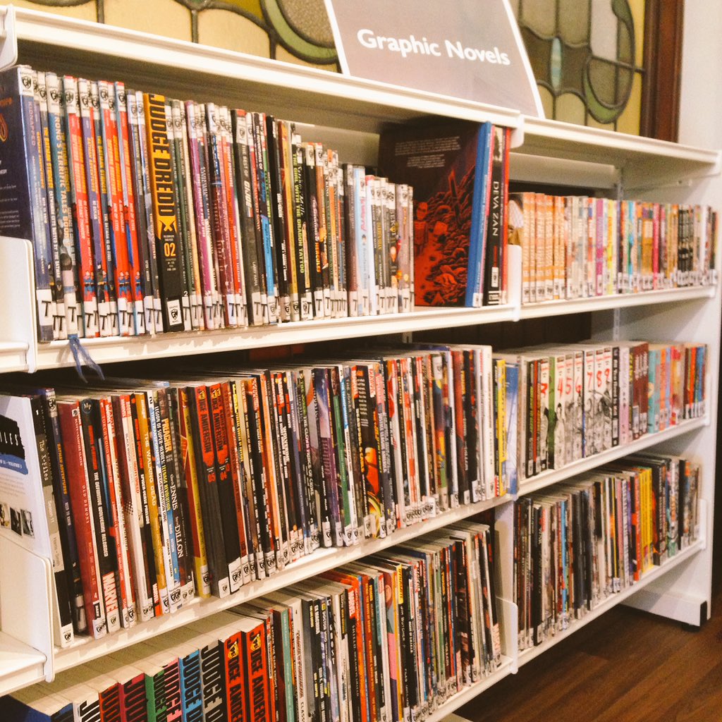 Here's ours! Post yours!  #ComicsInLibraries #shelfie 
The rules: 
1. Post a photo of your comics shelf
2. Use #ComicsInLibraries 
3. Nominate other libraries to post theirs (by quote RTing these rules)
4. Tag us or @ us so we can retweet
Please RT!