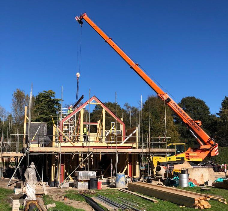 ba_bespokehomes's tweet image. The steels are being craned in at our client&apos;s project in East Sussex #steels #structuralframe #timberframe