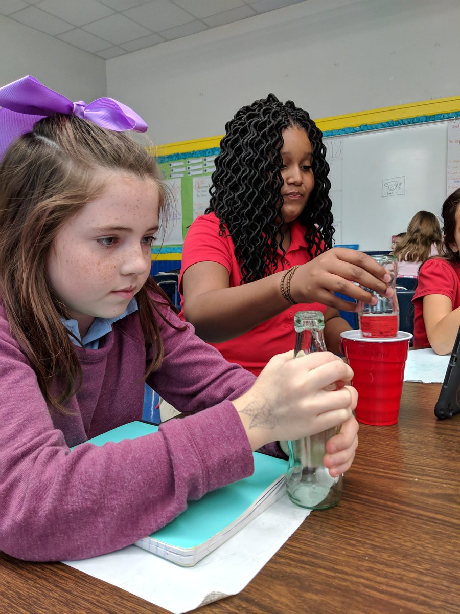 Jennifer_Eagle's tweet photo. Heat transfer through convection this week!  What causes bubbles to form at the top of the glass bottle?  @GQES_Dragons https://t.co/qP6AxjROMi