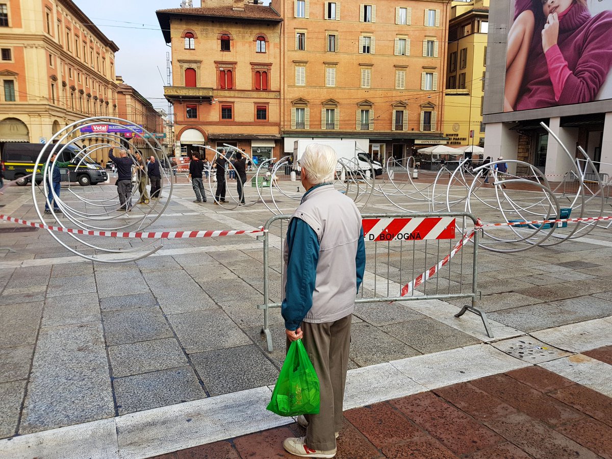 Cuamm's tweet photo. Medici con l’Africa Cuamm è arrivata a Bologna! L’installazione partecipativa con i tanti #ioconlafrica sta prendendo vita in Piazza del Nettuno in mezzo alla curiosità dei passanti. https://t.co/TQsHmuXkE0