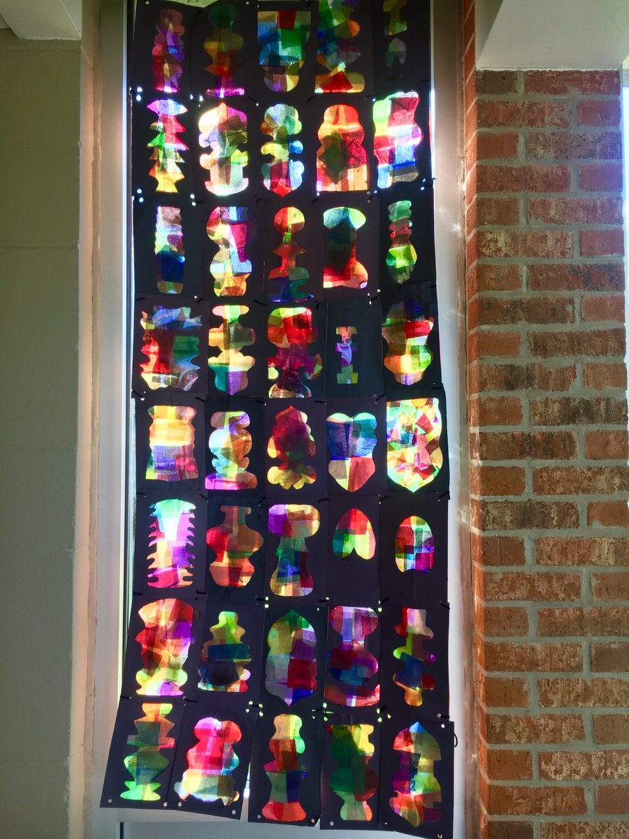 #Kinder’s stained-glass window on display next to the Mendez garden @mendezMrVart #colorful #morningsunlight #makinghallwaysbrighter #thanksBowieforlaminatersheets