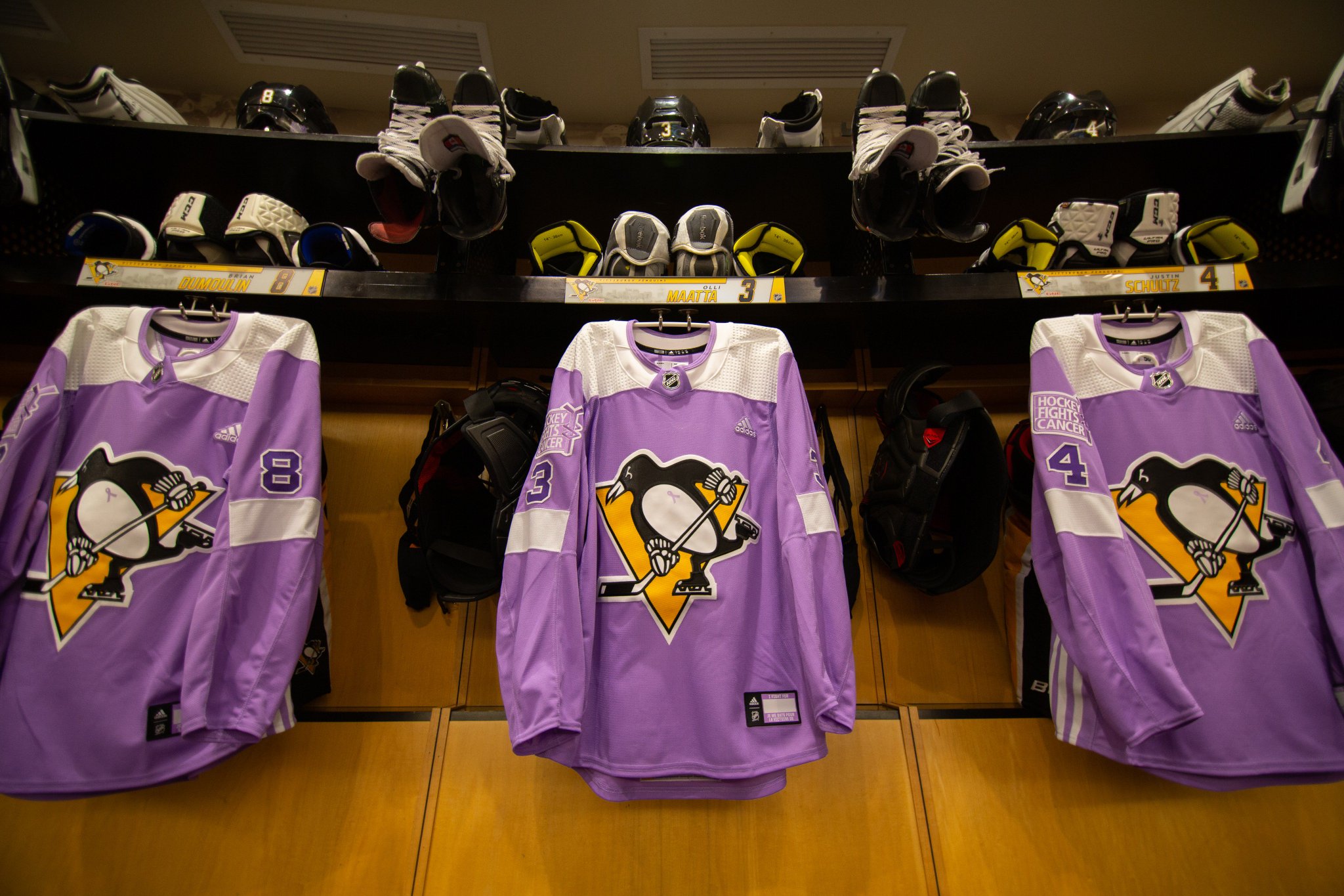 penguins purple jersey auction