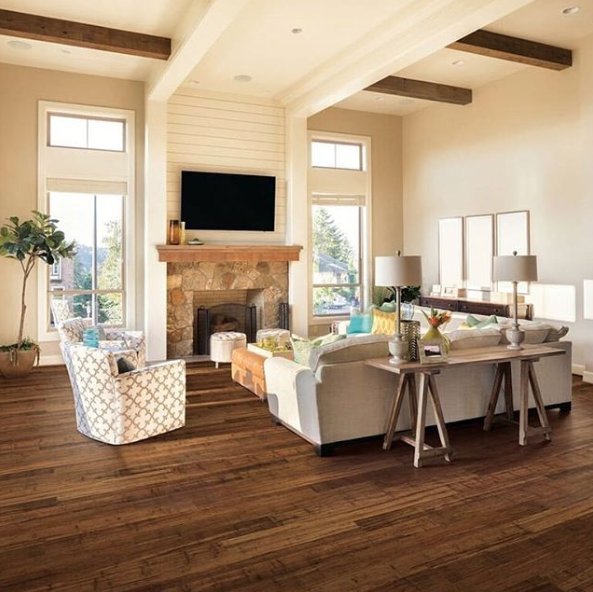 We can imagine relaxing in this dreamy living room featuring our Portfolio Naturals - Chestnut bamboo floors. A true classic!