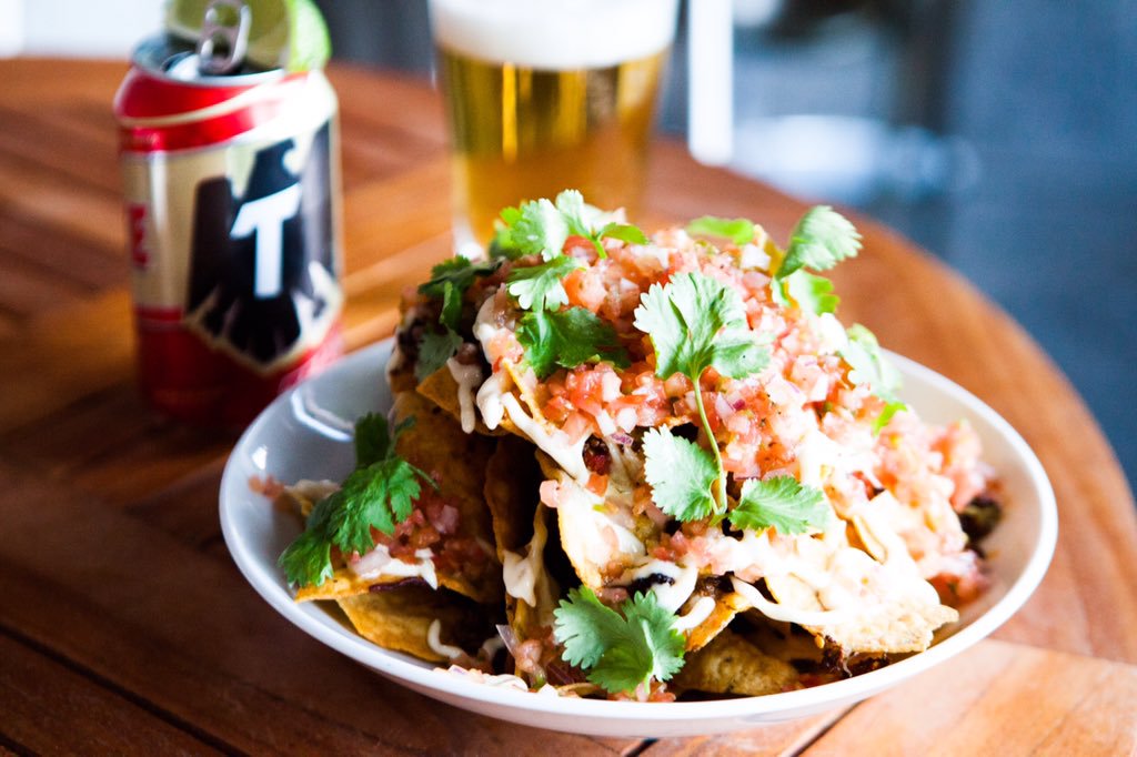 What better way to accompany #nationalnachoday than with a <a href="/tecate/">Tecate</a>?